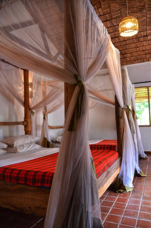 Honey Badger Lodge Moshi Bagian luar foto